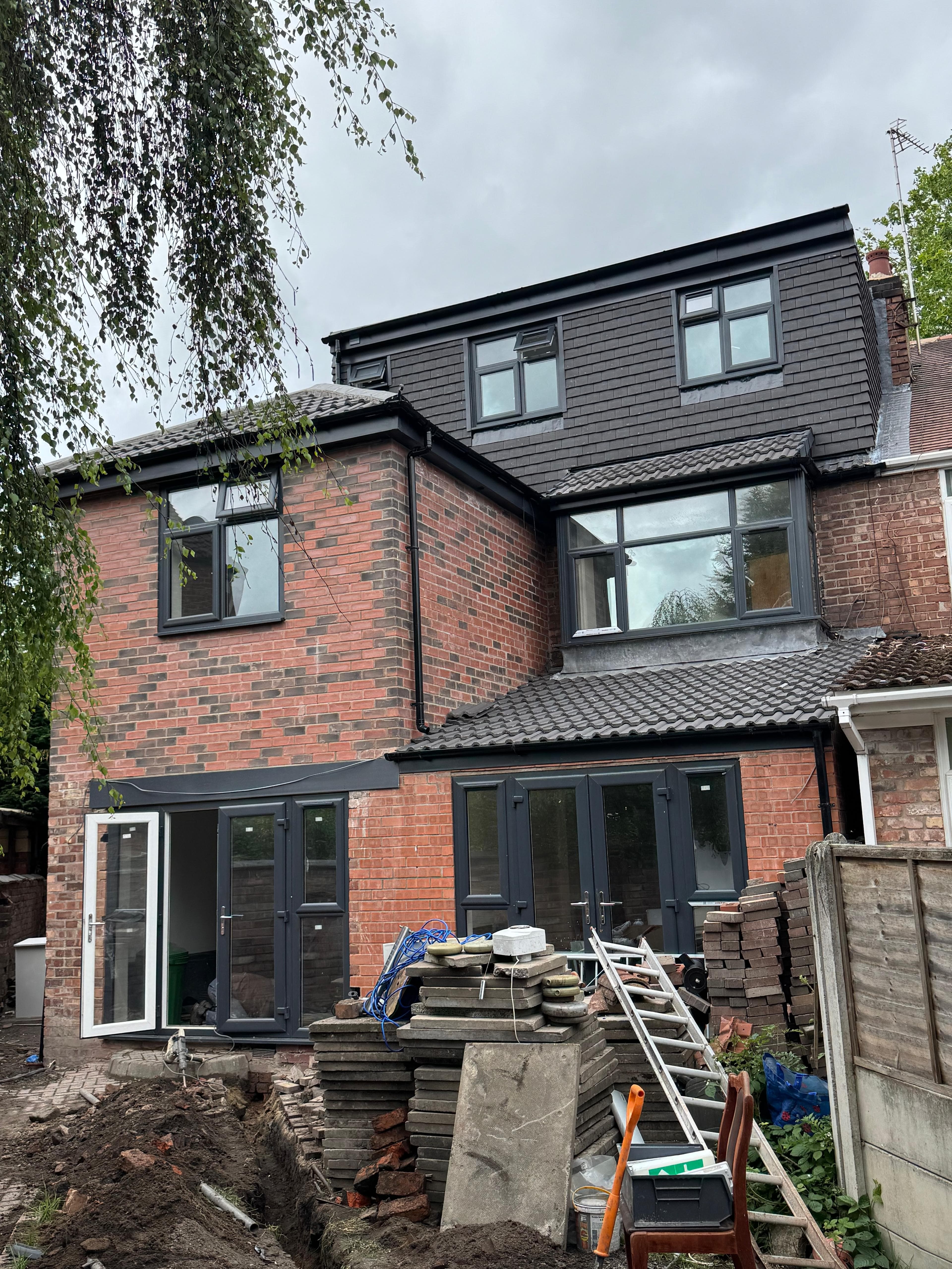 Double back extension and loft dormer delivered by Sky Construction in Manchester